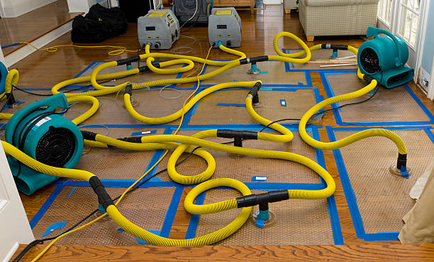Professional Flood Damage Restoration technician working in Nags Head, NC